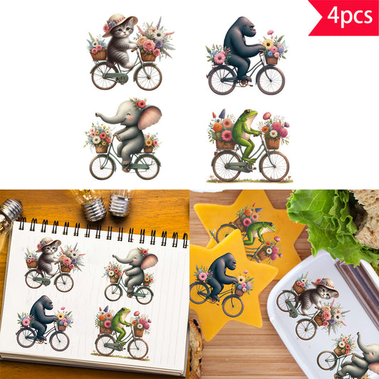 4PCS Cute animal and floral bicycle UV crystal transfer sticker set, featuring vintage-style designs of cats, gorillas, elephants, and frogs, perfect for adding an artistic and natural touch to glass jars and home decor. Self-adhesive and waterproof trans